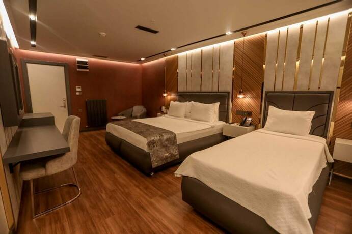 Imagen de la habitación del Class Suit Hotel. Foto 17