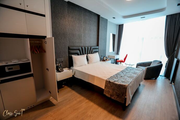 Imagen de la habitación del Class Suit Hotel. Foto 18