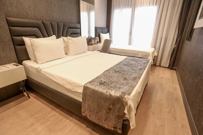 Imagen de la habitación del Class Suit Hotel. Foto 19