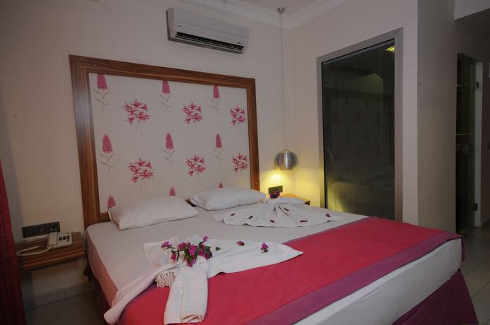 Imagen de la habitación del Cle Beach Boutique Hotel. Foto 17