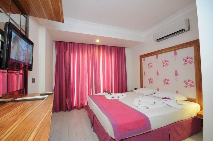 Imagen de la habitación del Cle Beach Boutique Hotel. Foto 19