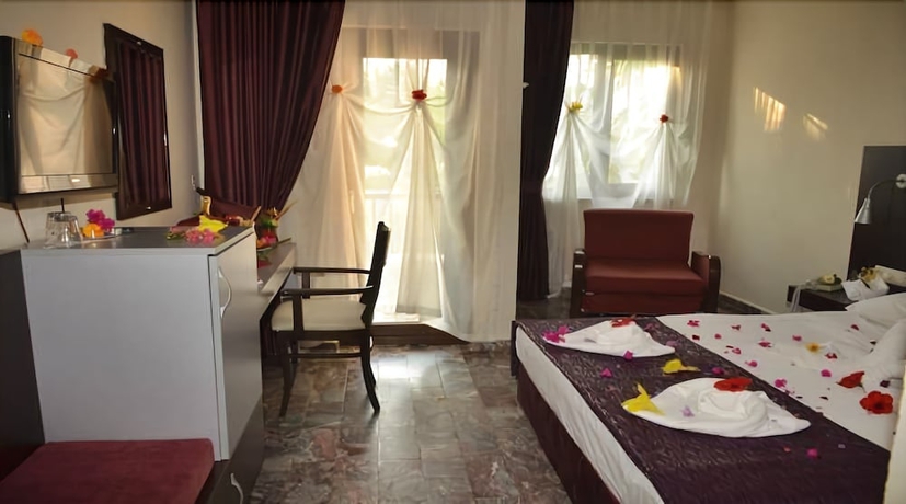 Imagen de la habitación del Club Akman Beach Hotel. Foto 9