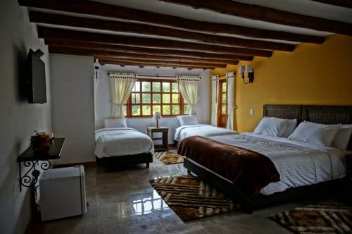 Imagen de la habitación del Club Campestre El Bosque De La Villa. Foto 1