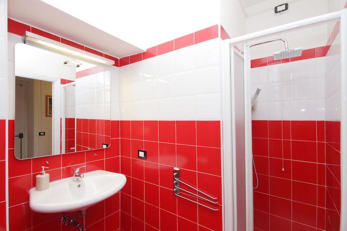 Imagen de la habitación del Coliseum Rooms. Foto 7