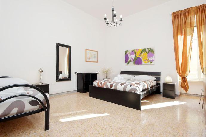 Imagen de la habitación del Coliseum Rooms. Foto 12