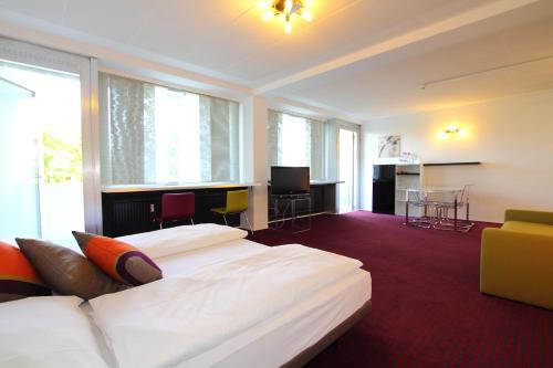 Imagen de la habitación del College Garden Hotel. Foto 17