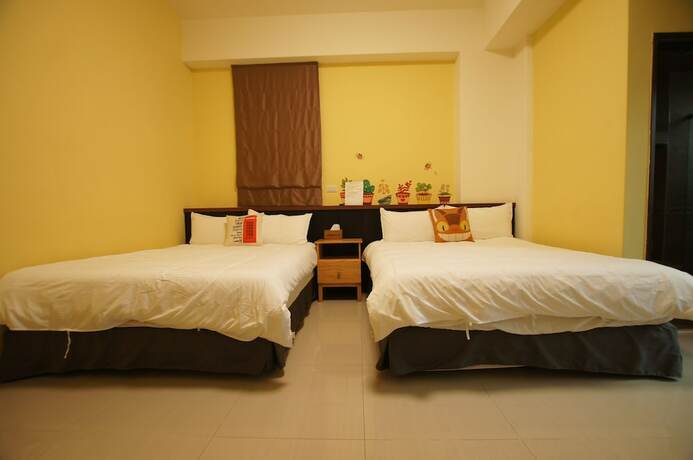 Imagen de la habitación del Com Inn. Foto 2