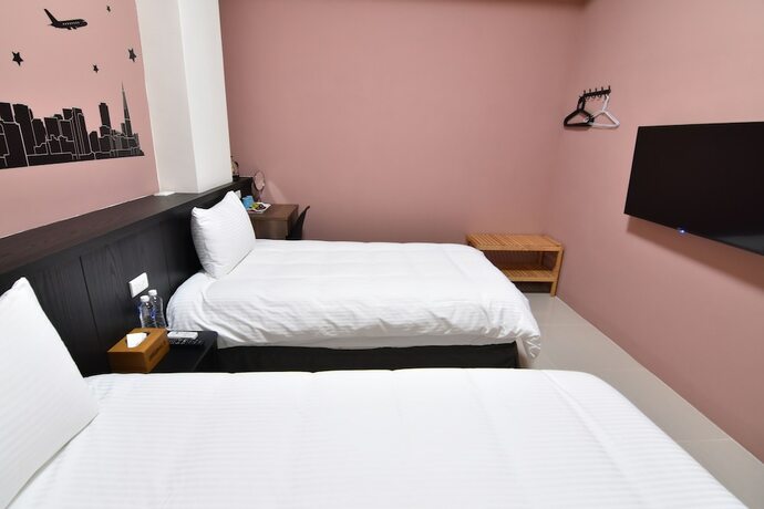 Imagen de la habitación del Com Inn. Foto 3