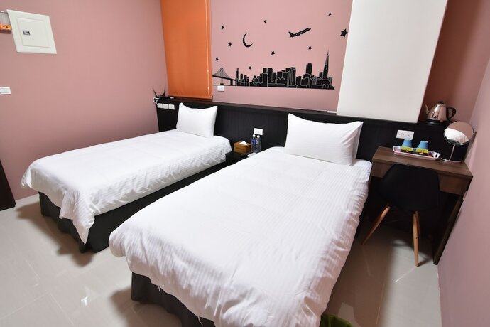 Imagen de la habitación del Com Inn. Foto 4