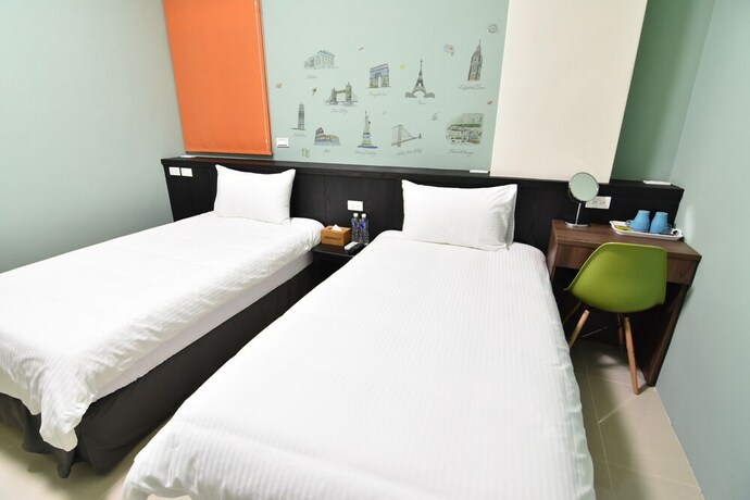 Imagen de la habitación del Com Inn. Foto 5