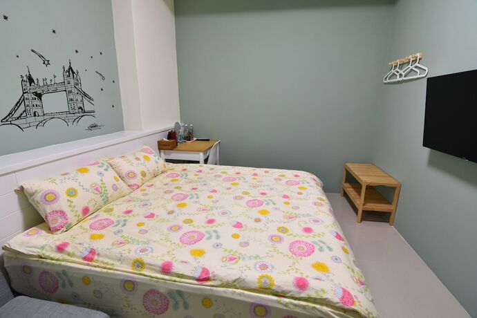 Imagen de la habitación del Com Inn. Foto 8