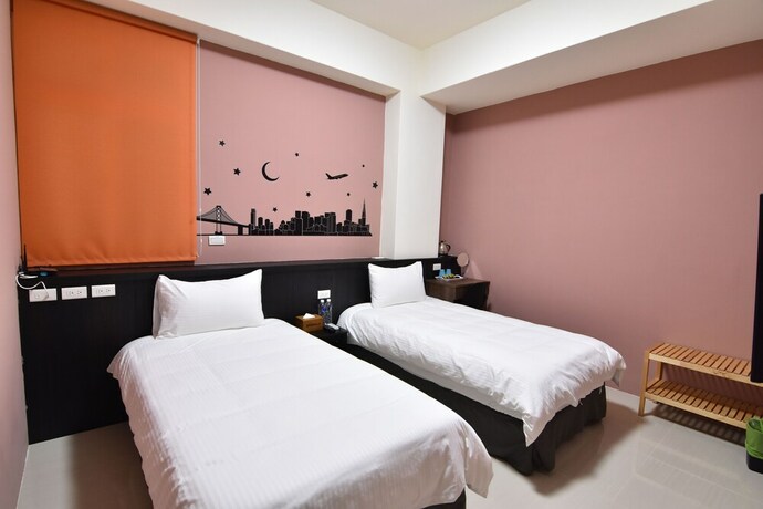Imagen de la habitación del Com Inn. Foto 11