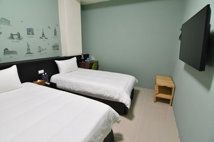 Imagen de la habitación del Com Inn. Foto 15