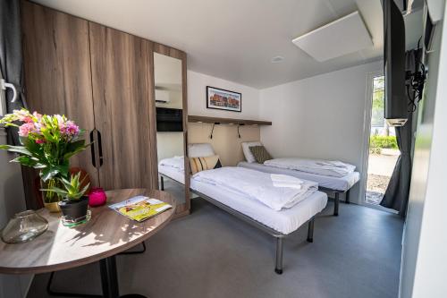 Imagen de la habitación del Comfort Rooms by EuroParcs Het Amsterdamse Bos. Foto 19