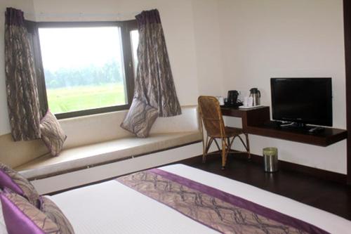 Imagen de la habitación del Corbett Tusker Trail. Foto 19