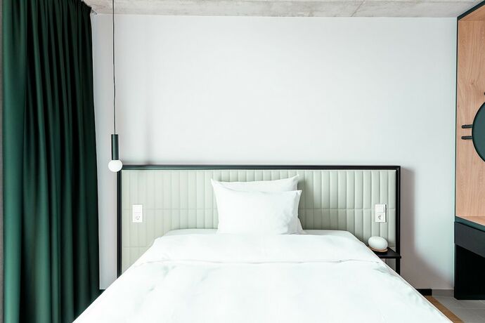 Imagen de la habitación del Coreum Hotel. Foto 19