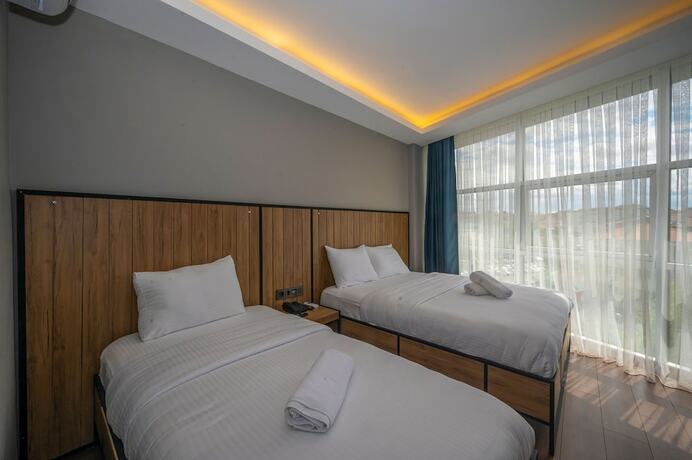 Imagen de la habitación del Corlu Dem Hotel. Foto 14