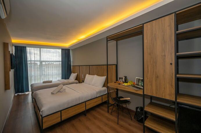 Imagen de la habitación del Corlu Dem Hotel. Foto 17
