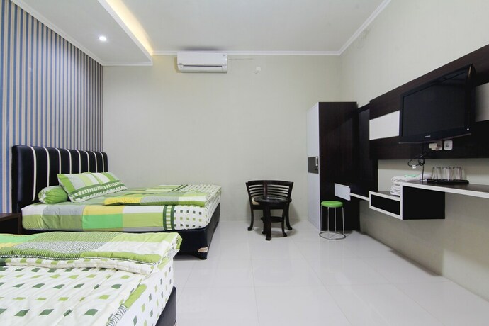 Imagen de la habitación del Cornel Homestay. Foto 12