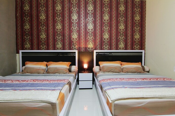 Imagen de la habitación del Cornel Homestay. Foto 13