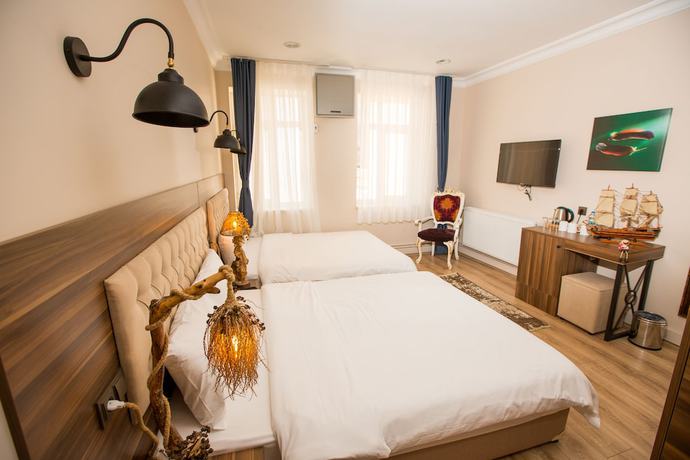 Imagen de la habitación del Corner Garden. Foto 2