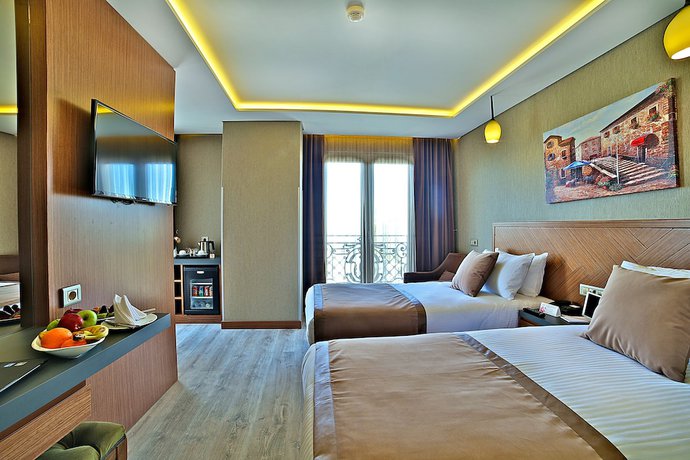 Imagen de la habitación del Corner Hotel. Foto 12