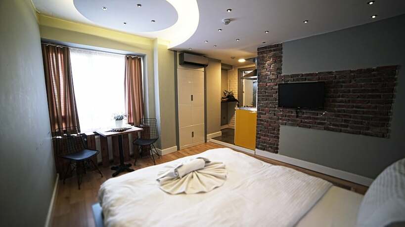 Imagen de la habitación del Corner Park Suites. Foto 16