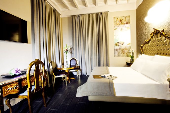 Imagen de la habitación del Corso 12 Rooms and Suites. Foto 7