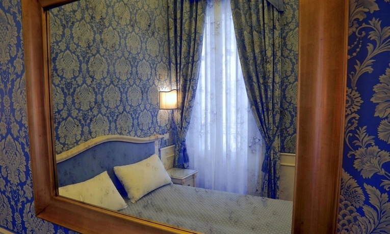 Imagen de la habitación del Corte Barozzi Venice Suites. Foto 11