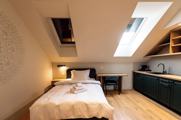 Imagen de la habitación del Corvin Boutique Residence. Foto 2