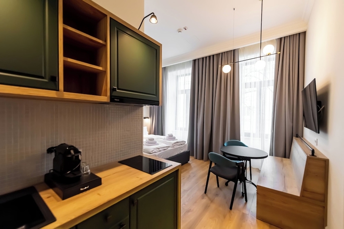 Imagen de la habitación del Corvin Boutique Residence. Foto 9