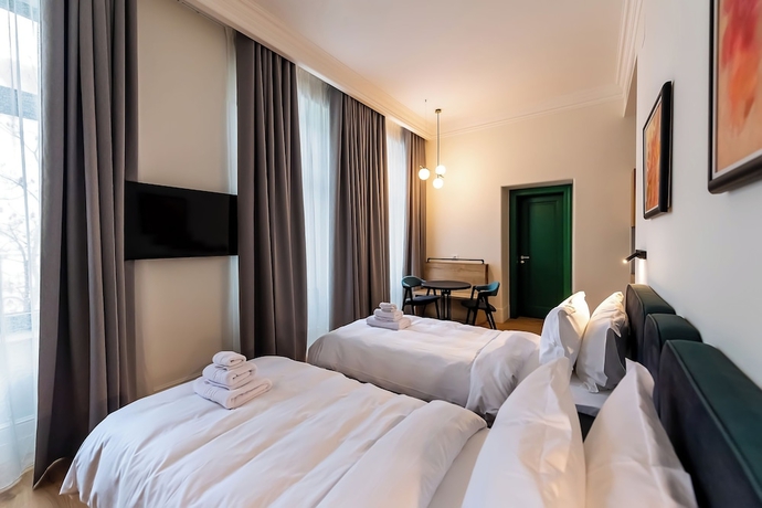 Imagen de la habitación del Corvin Boutique Residence. Foto 11