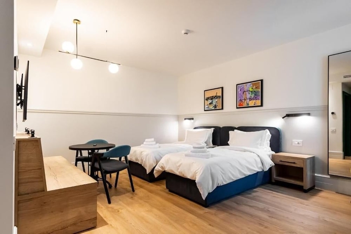 Imagen de la habitación del Corvin Boutique Residence. Foto 15