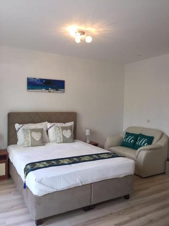Imagen de la habitación del Corvin Rose Apartment Hotel. Foto 3