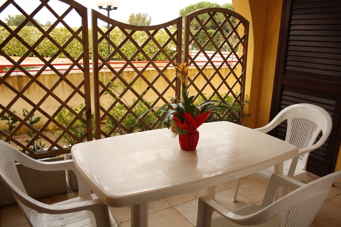 Imagen de la habitación del Costa D'oriente Residence Club. Foto 5