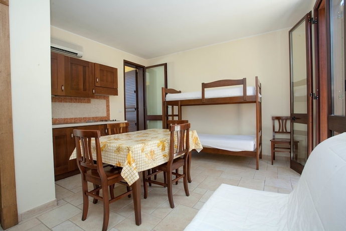 Imagen de la habitación del Costa D'oriente Residence Club. Foto 7