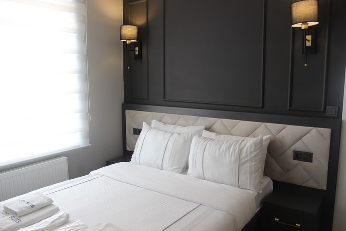 Imagen de la habitación del Cosy Suite Hotel. Foto 6