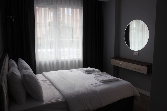 Imagen de la habitación del Cosy Suite Hotel. Foto 8