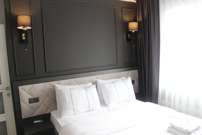 Imagen de la habitación del Cosy Suite Hotel. Foto 9