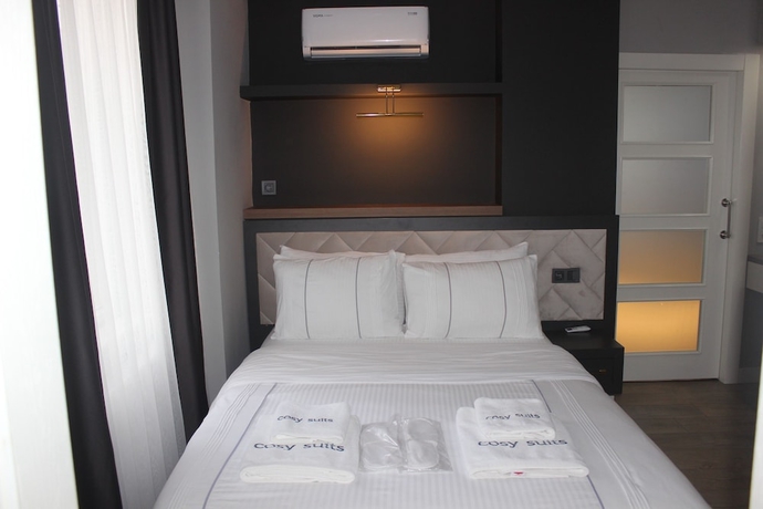 Imagen de la habitación del Cosy Suite Hotel. Foto 14