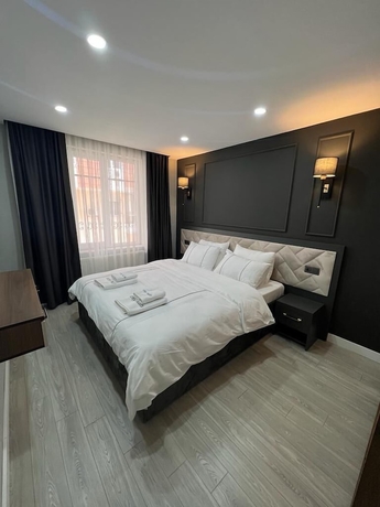 Imagen de la habitación del Cosy Suite Hotel. Foto 15