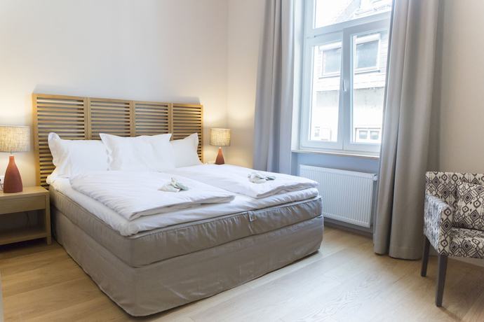 Imagen de la habitación del Cottage Rheingau Hotel. Foto 9