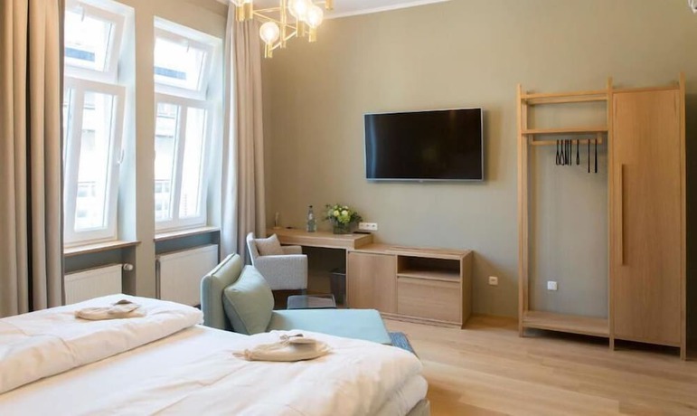 Imagen de la habitación del Cottage Rheingau Hotel. Foto 16