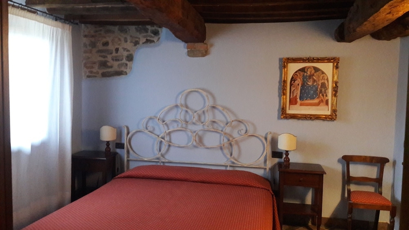 Imagen de la habitación del Country Hotel Poggiomanente. Foto 17