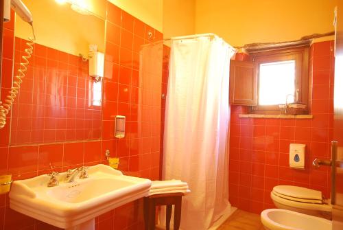 Imagen de la habitación del Country House La Lungavita. Foto 4