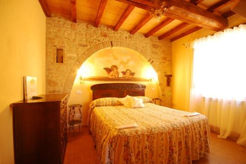 Imagen de la habitación del Country House La Lungavita. Foto 6