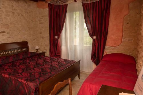Imagen de la habitación del Country House La Lungavita. Foto 7