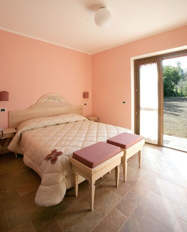 Imagen de la habitación del Country House Poggio Fiorito. Foto 15