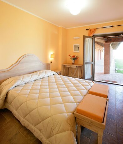 Imagen de la habitación del Country House Poggio Fiorito. Foto 16