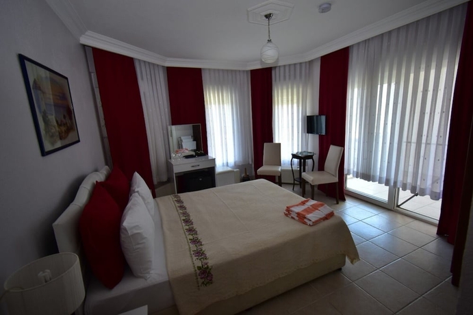 Imagen de la habitación del Cunda Asiyan Butik Otel. Foto 7